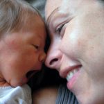 Homebirth Doula client with baby