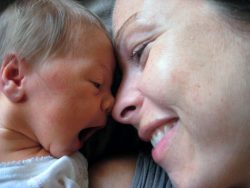 Homebirth Doula client with baby